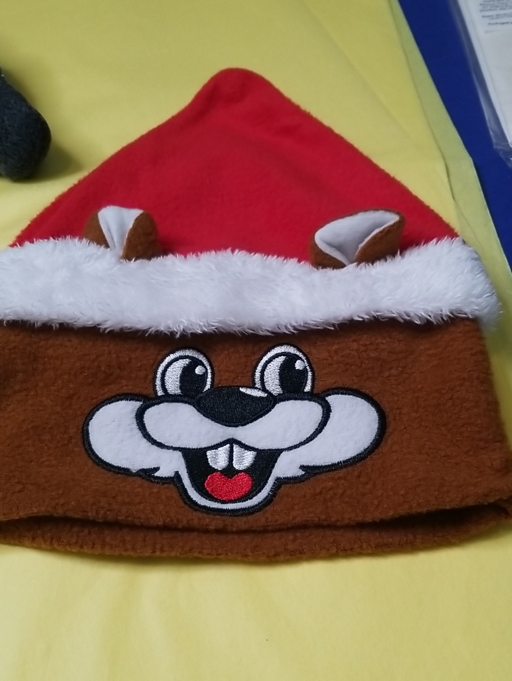 Three baby hats: Bucket Hat, Buckee Santa Cap, Tiger Cap Good Condition